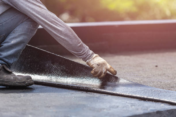 Professional Exterior Waterproofing technician working in Woodstock, GA